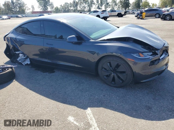 2025 Tesla Model 3 Long Range z VIN 5YJ3E1EB0SF986178, wystawiony jako Copart lot #57612115 z przebiegiem Nie podano mil oraz Szkoda całkowita • Salvage title. Historia ofert i sprzedaży dostępna na DreamBid. Obrazek 4.
