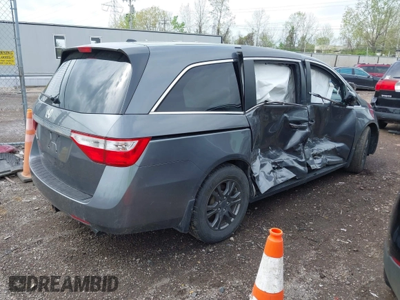 2012 Honda Odyssey EX-L with VIN 5FNRL5H64CB028040, listed as a IAAI auction lot 42126048 with 160,675 mi miles and . Bid and sale history available at DreamBid. Image 4.