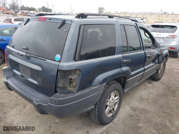 2004 Jeep Grand Cherokee Laredo with VIN 1J4GX48S64C291075, listed as a IAAI auction lot 41805747 with 282,384 mi miles. Bid and sale history available at carsss.com. Image 4.