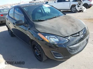 2013 Mazda Mazda2 Sport with VIN JM1DE1KY8D0164937, listed as a IAAI auction lot 41633364 with 134,984 mi miles. Bid and sale history available at carsss.com. Image 1.