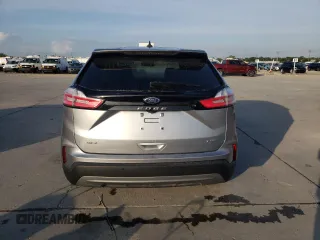 2023 Ford Edge SEL z VIN 2FMPK4J90PBA38667, wystawiony jako Copart lot #54534815 z przebiegiem Nie podano mil oraz Szkoda całkowita • Salvage title. Historia ofert i sprzedaży dostępna na DreamBid. Obrazek 6.