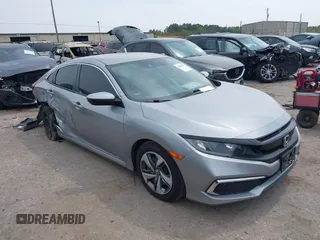 2019 Honda Civic LX with VIN 19XFC2F66KE026931, listed as a IAAI auction lot 41885137 with 55,057 mi miles and . Bid and sale history available at DreamBid. Image 1.
