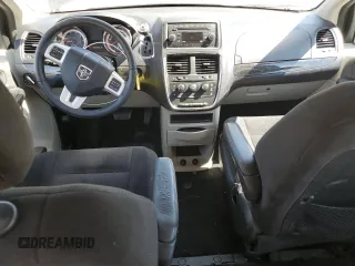 2014 Dodge Grand Caravan American Value with VIN 2C4RDGBG2ER361449, listed as a Copart auction lot 54940615 with 85,012 mi miles and Salvage Title. Bid and sale history available at DreamBid. Image 8.