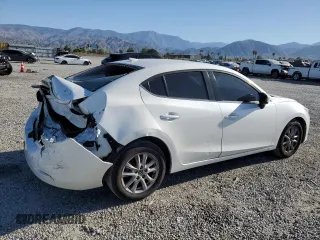 2015 Mazda 3 i Touring with VIN JM1BM1V70F1265495, listed as a Copart auction lot 52867345 with 154,496 mi miles and Salvage Title. Bid and sale history available at DreamBid. Image 3.