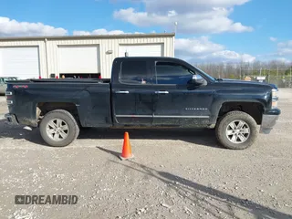 2014 Chevrolet Silverado 1500 LTZ with VIN 1GCVKSEC1EZ105678, listed as a IAAI auction lot 41299817 with 142,014 mi miles and . Bid and sale history available at DreamBid. Image 13.