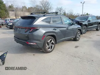 2023 Hyundai Tucson SEL with VIN 5NMJFCAE0PH281533, listed as a IAAI auction lot 41738468 with 36,881 mi miles and . Bid and sale history available at DreamBid. Image 4.
