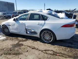 2016 Jaguar XF 35t Prestige with VIN SAJBK4BV3GCY21901, listed as a Copart auction lot 87926165 with 140,124 mi miles and Salvage Title. Bid and sale history available at carsss.com. Image 2.