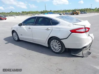 2014 Ford Fusion Energi Titanium with VIN 3FA6P0SU0ER149155, listed as a IAAI auction lot 41519306 with 148,406 mi miles. Bid and sale history available at carsss.com. Image 3.