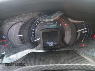 2012 Honda Insight LX with VIN JHMZE2H50CS004626, listed as a Copart auction lot 65198795 with 153,085 mi miles and Clean title. Bid and sale history available at DreamBid. Image 8.
