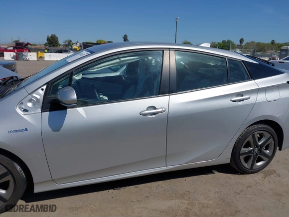 2022 Toyota Prius L Eco with VIN JTDKAMFU3N3190048, listed as a IAAI auction lot 41982252 with 19,189 mi miles. Bid and sale history available at carsss.com. Image 14.
