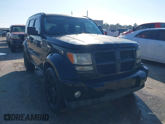2007 Dodge Nitro SLT with VIN 1D8GT58K97W666680, listed as a IAAI auction lot 41573904 with 171,795 mi miles. Bid and sale history available at carsss.com. Image 1.