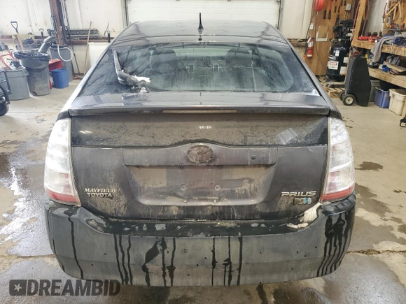 2008 Toyota Prius z VIN JTDKB20U883354506, wystawiony jako Copart lot #48565205 z przebiegiem 299 246 mil mil oraz Szkoda całkowita • Salvage title. Historia ofert i sprzedaży dostępna na DreamBid. Obrazek 6.