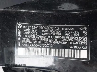 1996 Mercedes-Benz E-Class with VIN WDBJF55F0TJ007170, listed as a IAAI auction lot 41147514 with 122,044 mi miles. Bid and sale history available at carsss.com. Image 9.