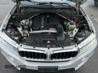 2016 BMW X5 xDrive35i with VIN 5UXKR0C56G0P30283, listed as a Copart auction lot 52831205 with 205,300 mi miles and Clean Title. Bid and sale history available at carsss.com. Image 7.