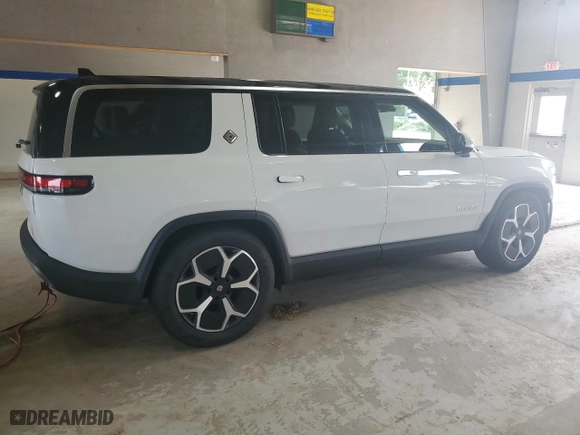2023 Rivian R1S Adventure with VIN 7PDSGABAXPN021962, listed as a Copart auction lot 66184454 with 0 mi miles and Salvage Title. Bid and sale history available at carsss.com. Image 3.
