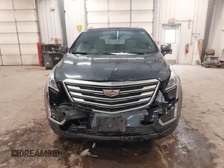2019 Cadillac XT5 Luxury AWD z VIN 1GYKNDRS0KZ213092, wystawiony jako IAAI lot #41510497 z przebiegiem 26 030 mil mil oraz . Historia ofert i sprzedaży dostępna na DreamBid. Obrazek 12.