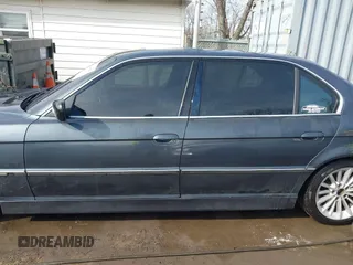 2001 BMW 7 Series 740iL with VIN WBAGH83491DP28749, listed as a IAAI auction lot 41440556 with 198,734 mi miles. Bid and sale history available at carsss.com. Image 14.