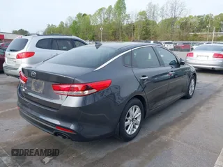 2016 Kia Optima LX with VIN KNAGT4L33G5107444, listed as a IAAI auction lot 41971006 with 174,997 mi miles. Bid and sale history available at carsss.com. Image 4.