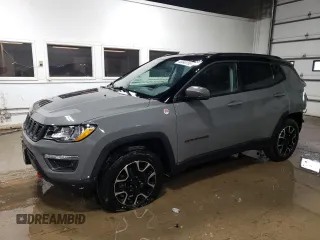 2020 Jeep Compass Trailhawk with VIN 3C4NJDDB0LT215553, listed as a Copart auction lot 45045165 with 90,702 mi miles and Salvage Title. Bid and sale history available at carsss.com. Image 1.