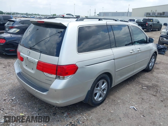 2009 Honda Odyssey Touring z VIN 5FNRL38949B002092, wystawiony jako IAAI lot #42072003 z przebiegiem Nie podano mil oraz . Historia ofert i sprzedaży dostępna na DreamBid. Obrazek 4.