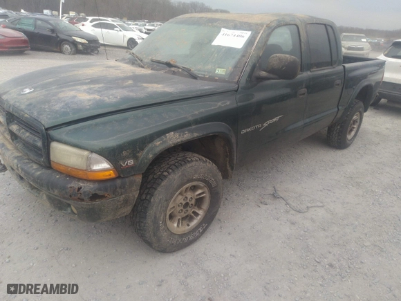 2000 Dodge Dakota Sport with VIN 1B7HG2AZ6YS661541, listed as a IAAI auction lot 41674406 with 204,117 mi miles. Bid and sale history available at carsss.com. Image 18.