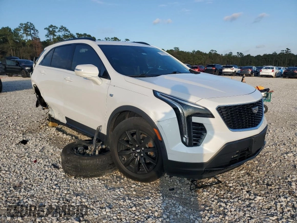 2022 Cadillac XT4 FWD Sport with VIN 1GYFZER48NF169913, listed as a Copart auction lot 84457034 with 36,406 mi miles and Clean title. Bid and sale history available at DreamBid. Image 4.