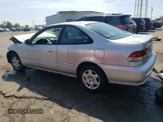 2000 Honda Civic EX with VIN 1HGEJ8240YL059711, listed as a Copart auction lot 69014064 with 144,354 mi miles and Salvage Title. Bid and sale history available at carsss.com. Image 2.