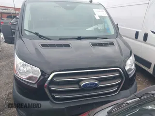 2020 Ford Transit Cargo with VIN 1FTYE1Y80LKB76611, listed as a IAAI auction lot 42445263 with 104,540 mi miles and . Bid and sale history available at DreamBid. Image 12.