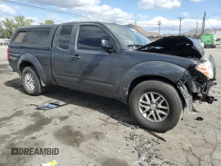 2015 Nissan Frontier SV with VIN 1N6BD0CTXFN708820, listed as a Copart auction lot 56605085 with 119,299 mi miles and Salvage title. Bid and sale history available at DreamBid. Image 4.