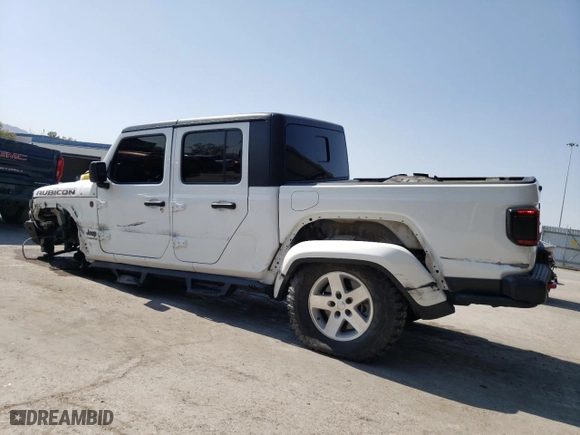 2020 Jeep Gladiator Rubicon with VIN 1C6JJTBG3LL138767, listed as a Copart auction lot 58490974 with 48,542 mi miles and Salvage Title. Bid and sale history available at carsss.com. Image 2.