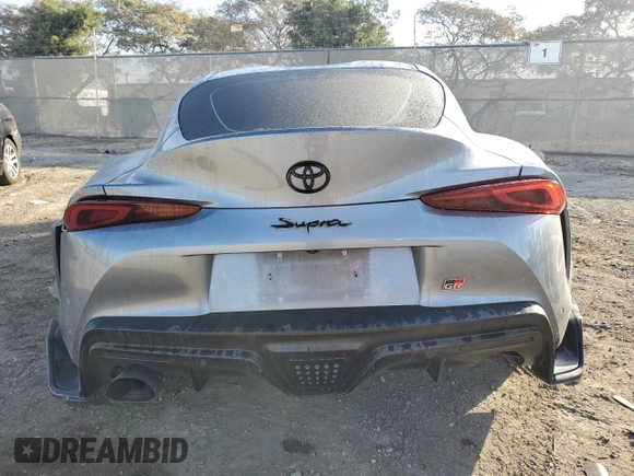2022 Toyota Supra 3.0 with VIN WZ1DB0C0XNW046741, listed as a Copart auction lot 43457735 with 60,705 mi miles and Salvage title. Bid and sale history available at DreamBid. Image 6.