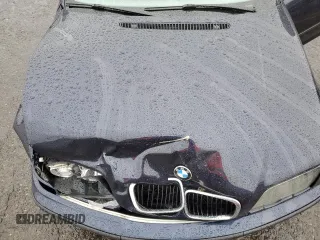 2000 BMW 3 Series 323i with VIN WBAAM3340YFP70049, listed as a Copart auction lot 58064415 with 122,574 mi miles and Clean title. Bid and sale history available at DreamBid. Image 11.