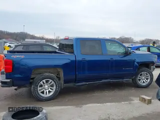 2016 Chevrolet Silverado 1500 LT with VIN 3GCUKRECXGG359705, listed as a IAAI auction lot 41644633 with 157,957 mi miles and . Bid and sale history available at DreamBid. Image 14.