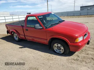 1995 GMC Sonoma z VIN 1GTCS144XS8524819, wystawiony jako Copart lot #52608765 z przebiegiem 84 794 mil mil oraz Szkody całkowita. Historia ofert i sprzedaży dostępna na DreamBid. Obrazek 4.