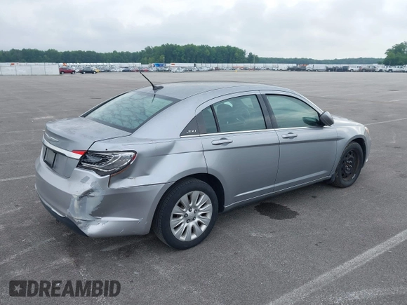 2013 Chrysler 200 LX with VIN 1C3CCBABXDN640536, listed as a IAAI auction lot 39425402 with 188,960 mi miles. Bid and sale history available at carsss.com. Image 4.
