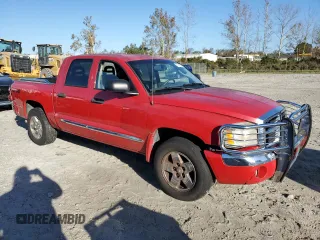 2005 Dodge Dakota Laramie with VIN 1D7HW58N65S263982, listed as a Copart auction lot 77470884 with 164,809 mi miles and Clean Title. Bid and sale history available at DreamBid. Image 4.