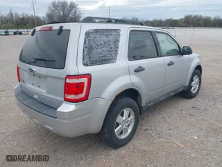 2011 Ford Escape XLT with VIN 1FMCU9D72BKB26439, listed as a IAAI auction lot 41914514 with 242,172 mi miles. Bid and sale history available at carsss.com. Image 4.