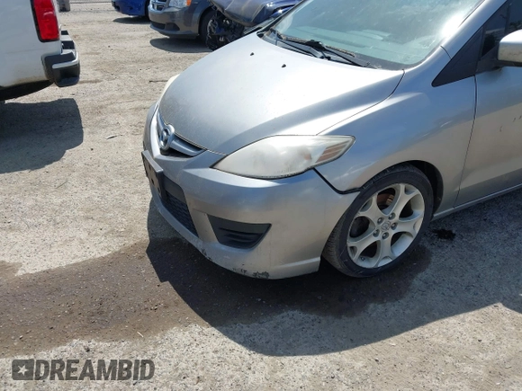 2010 Mazda 5 Sport with VIN JM1CR2WL3A0372322, listed as a IAAI auction lot 42354466 with 249,661 mi miles and . Bid and sale history available at DreamBid. Image 6.