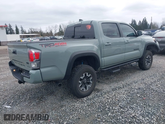 2023 Toyota Tacoma 4WD SR with VIN 3TMCZ5AN3PM621797, listed as a IAAI auction lot 41627120 with 14,326 mi miles. Bid and sale history available at carsss.com. Image 4.
