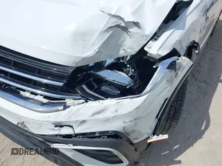 2022 Volkswagen Tiguan S z VIN 3VV1B7AX0NM126321, wystawiony jako IAAI lot #41939646 z przebiegiem 62 309 mil mil oraz . Historia ofert i sprzedaży dostępna na DreamBid. Obrazek 18.