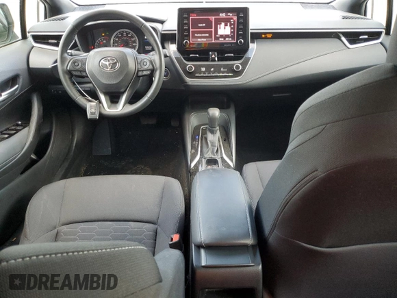 2021 Toyota Corolla SE with VIN JTND4MBE5M3138073, listed as a Copart auction lot 79409024 with 52,645 mi miles and Salvage Title. Bid and sale history available at DreamBid. Image 8.