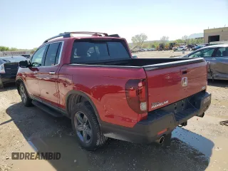 2023 Honda Ridgeline RTL-E with VIN 5FPYK3F76PB016502, listed as a Copart auction lot 54107235 with 27,516 mi miles and Salvage title. Bid and sale history available at DreamBid. Image 2.