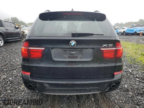 2012 BMW X5 35i with VIN 5UXZV4C57CL765053, listed as a Copart auction lot 59997275 with 157,943 mi miles and Salvage title. Bid and sale history available at DreamBid. Image 6.