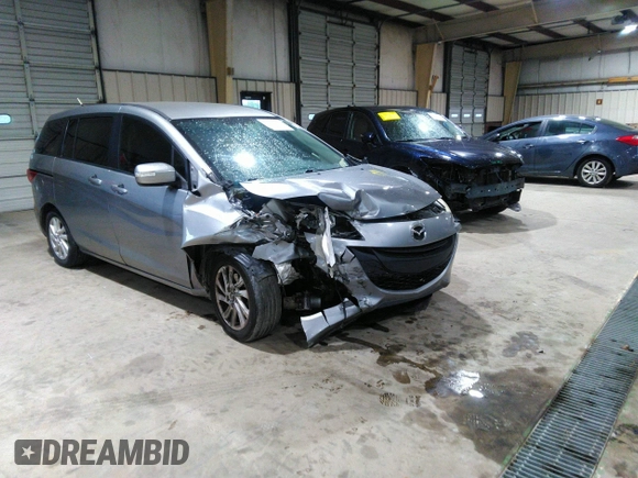 2013 Mazda 5 Sport with VIN JM1CW2BL5D0156684, listed as a IAAI auction lot 41966696 with 121,654 mi miles and . Bid and sale history available at DreamBid. Image 1.