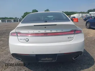2016 Lincoln MKZ z VIN 3LN6L2JK8GR626690, wystawiony jako IAAI lot #42438226 z przebiegiem 51 678 mil mil oraz . Historia ofert i sprzedaży dostępna na DreamBid. Obrazek 16.