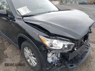 2016 Mazda CX-5 Touring with VIN JM3KE4CY4G0738713, listed as a IAAI auction lot 41998597 with 146,595 mi miles and . Bid and sale history available at carsss.com. Image 17.