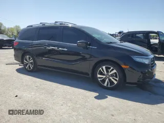 2021 Honda Odyssey Touring with VIN 5FNRL6H80MB036564, listed as a Copart auction lot 52218215 with 44,556 mi miles and Salvage Title. Bid and sale history available at carsss.com. Image 4.