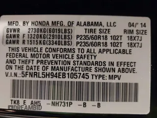 2014 Honda Odyssey Touring with VIN 5FNRL5H94EB105745, listed as a IAAI auction lot 41744012 with 77,032 mi miles and . Bid and sale history available at DreamBid. Image 9.