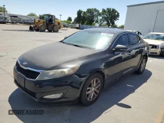 2013 Kia Optima LX z VIN 5XXGM4A75DG217392, wystawiony jako Copart lot #55646025 z przebiegiem 202 429 mil mil oraz Czysty tytuł • Clean title. Historia ofert i sprzedaży dostępna na DreamBid. Obrazek 1.