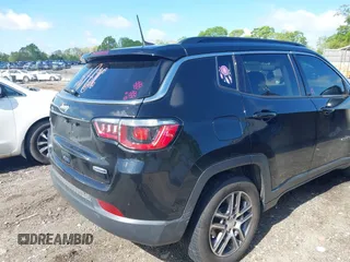 2020 Jeep Compass Latitude with VIN 3C4NJCBBXLT166004, listed as a IAAI auction lot 42025390 with 106,271 mi miles and . Bid and sale history available at carsss.com. Image 4.